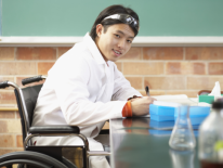 Young Asian student in lab with a wheelchair